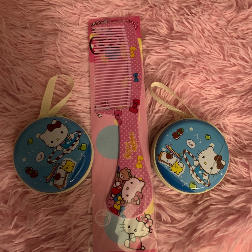 Hello kitty hard case zip close tins.